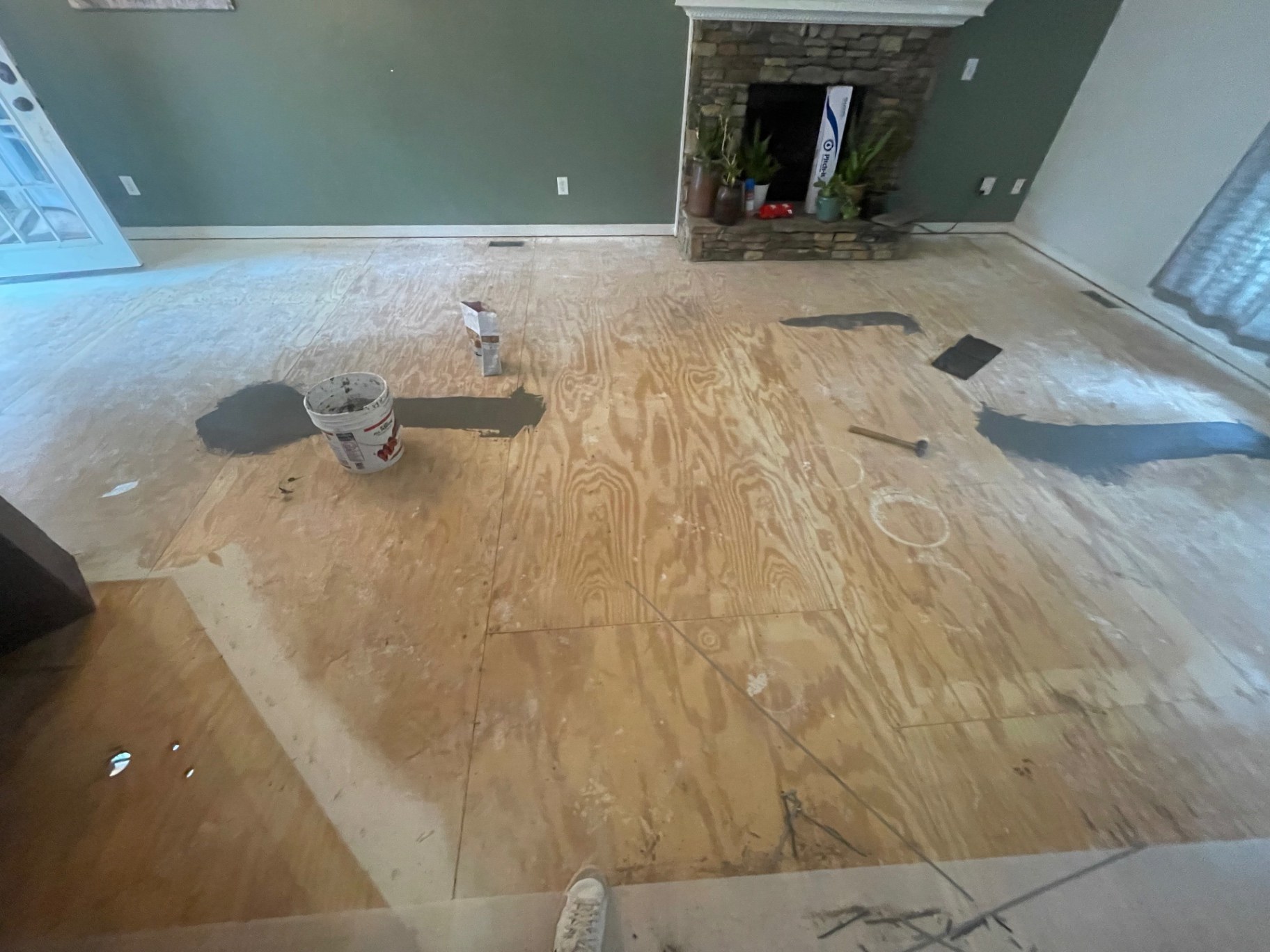 In-Progress flooring — Old tile removed and subfloor patched flat before new flooring — Gainesville, Buford & Flowery Branch GA